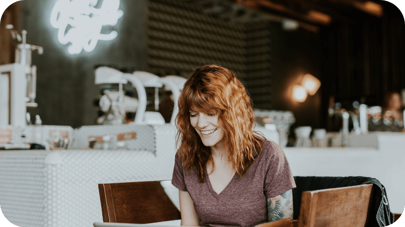 Female working in a modern cafe setting