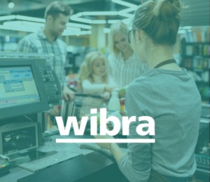 A family checking out at a store